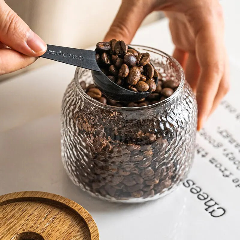 Bote hermético de vidrio con tapa de madera