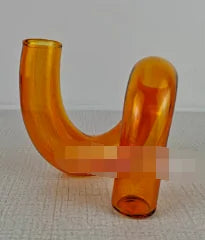 Decoración elegante en vidrio: jarrón y candelabro